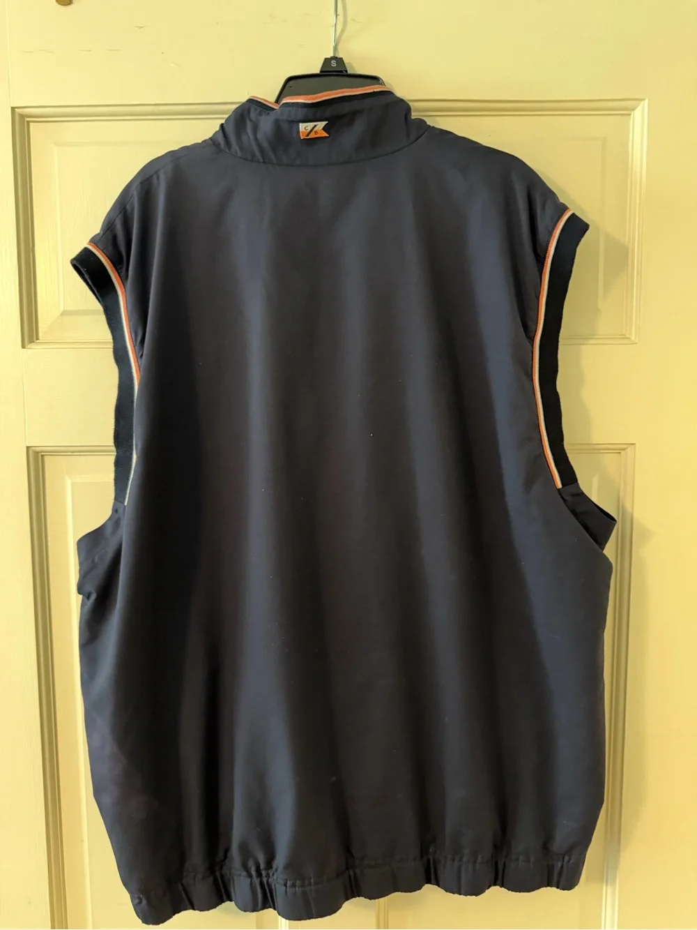 Cutter & Buck ladies Navy Sleeveless Golf Pullover with Coral Trim